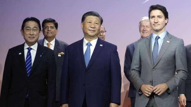 Japan's Prime Minister Fumio Kishida, Chinese President Xi Jinping and Canada's Prime Minister Justin Trudeau pose for a family photo at the annual Asia-Pacific Economic Cooperation summit, Thursday, Nov. 16, 2023, in San Francisco. (AP Photo/Godofredo A. Vásquez)